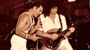 El guitarrista de la banda Queen recibe título de parte del rey Carlos III